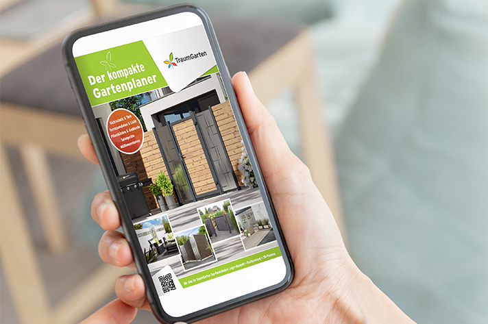 Smartphone mit geöffnetem Gartenplaner auf dem Display